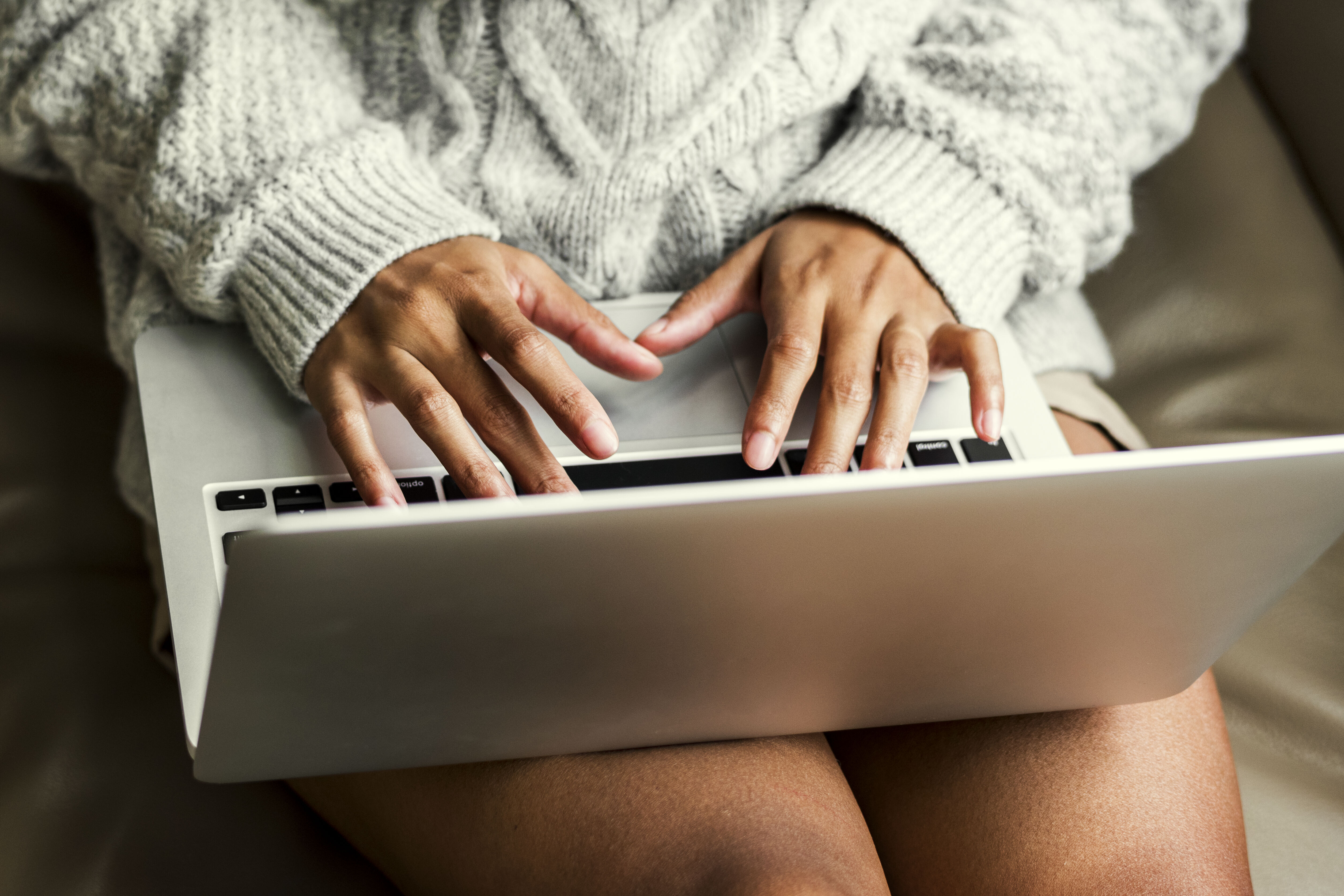 closeup of woman working on laptop