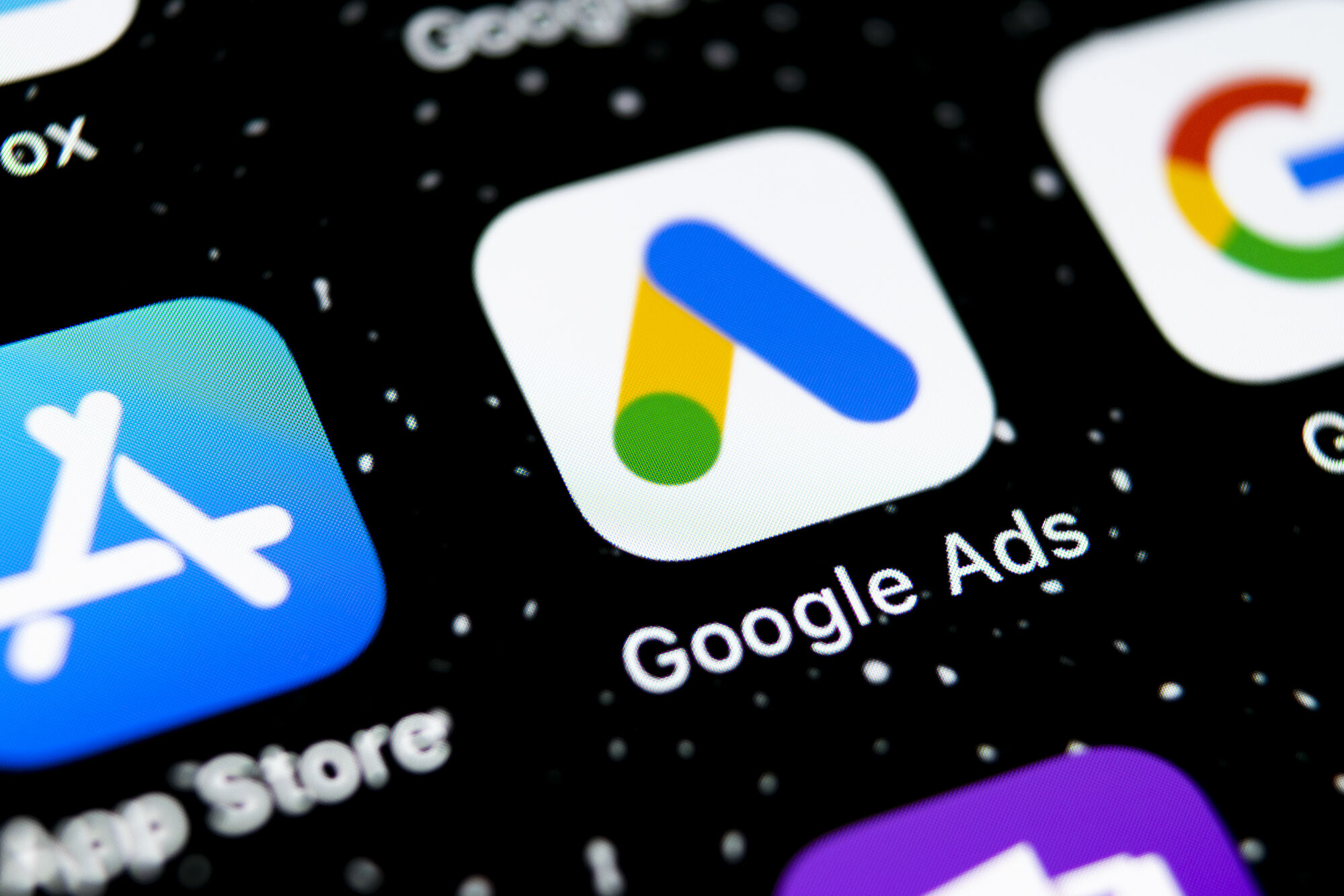 Close up of app icons on a phone with Google Ads app focused and centered
